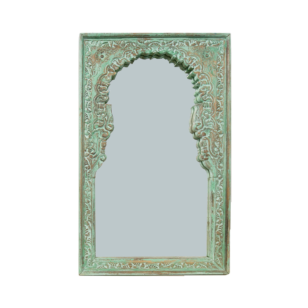 green carved mirror
